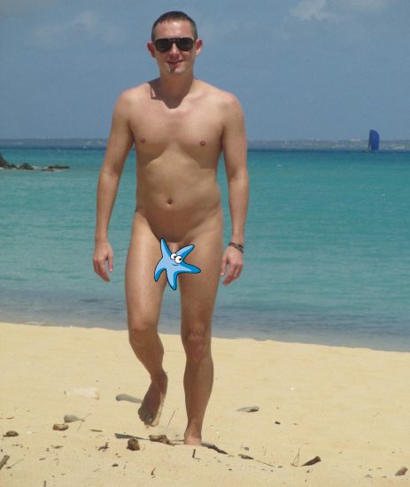 Beach man with a shaved penis