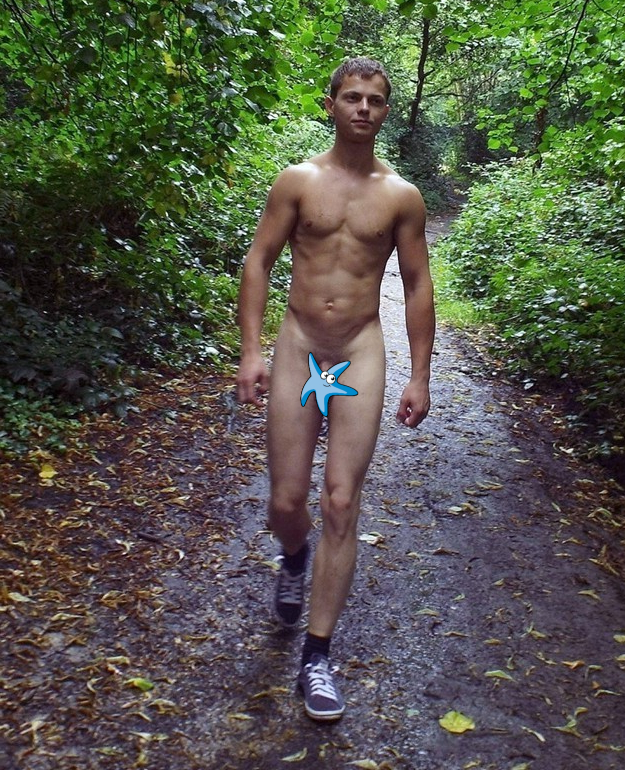 Nude boy walking in the forest
