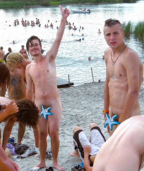 Nude boys by a lake