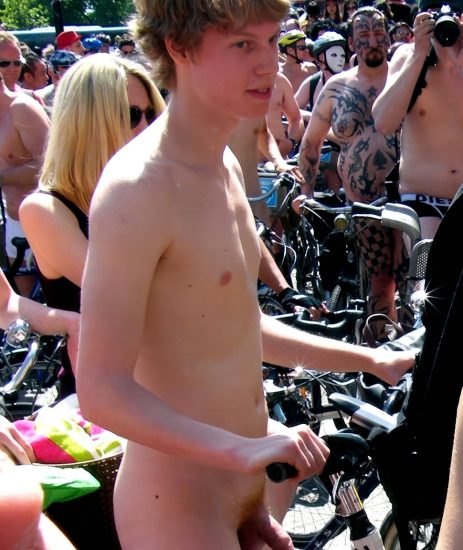 Nude guy on a bike