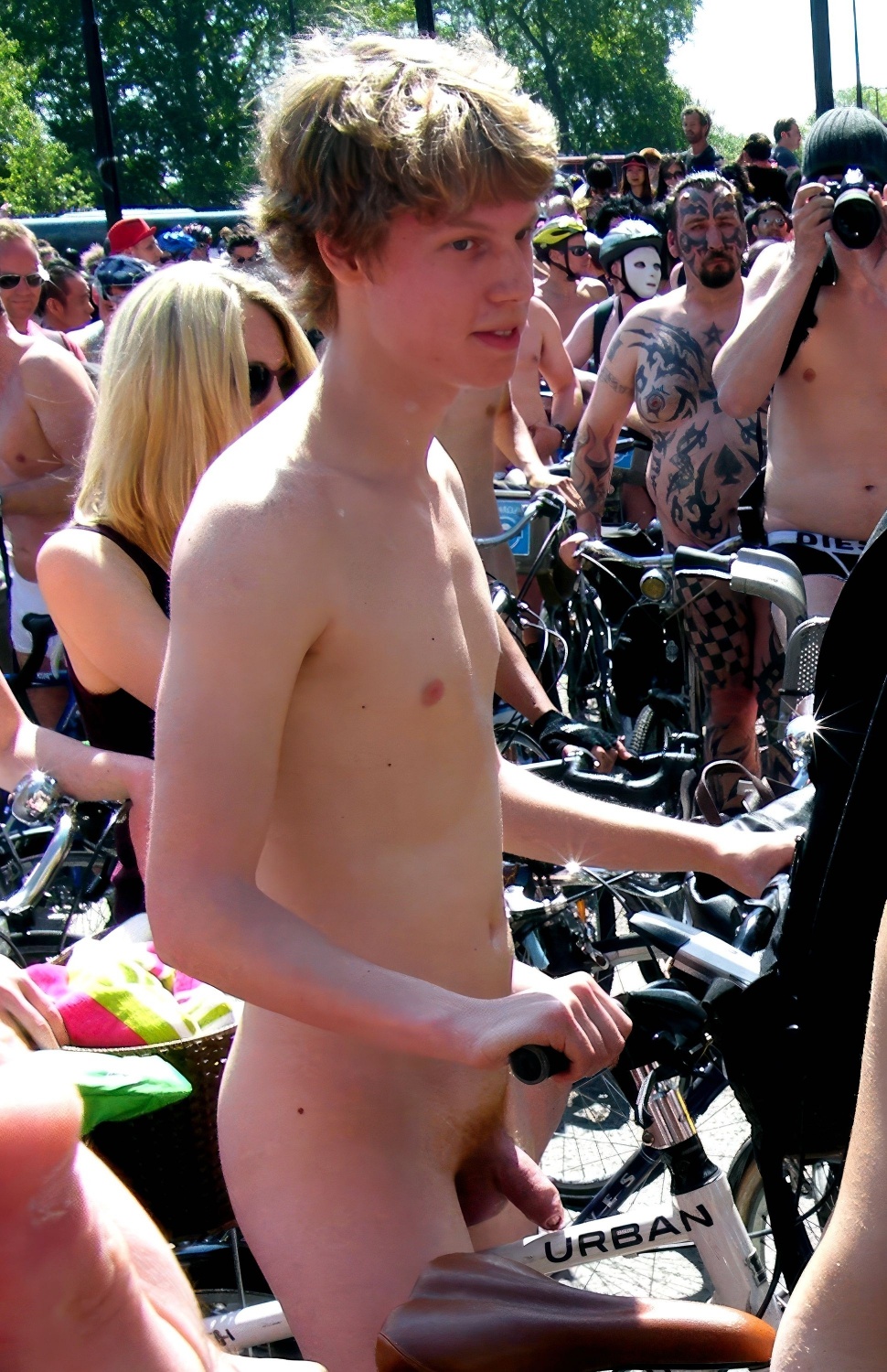 Nude guy on a bike