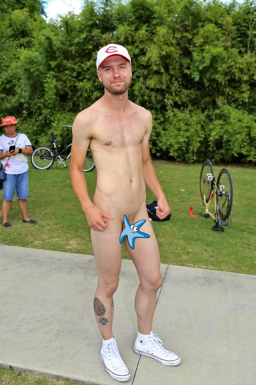 Nude man in a park