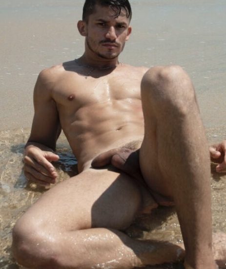 Nude man on a beach