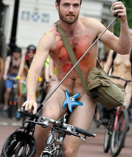 Nude man riding his bike