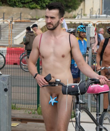 Nude man with a bike