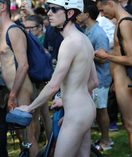 Nude twink with his bike