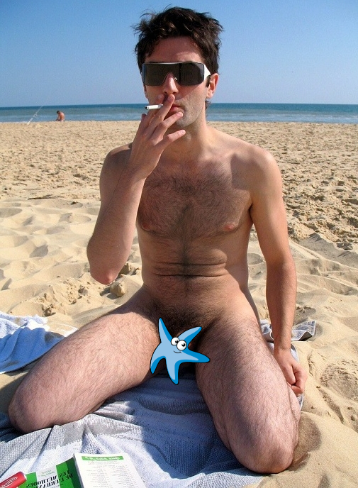 Smoking nude man on a beach